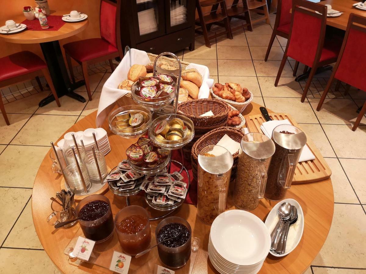 Tuniberg Restaurant Hotel ไฟรบวร์กอิมไบรส์เกา ภายนอก รูปภาพ